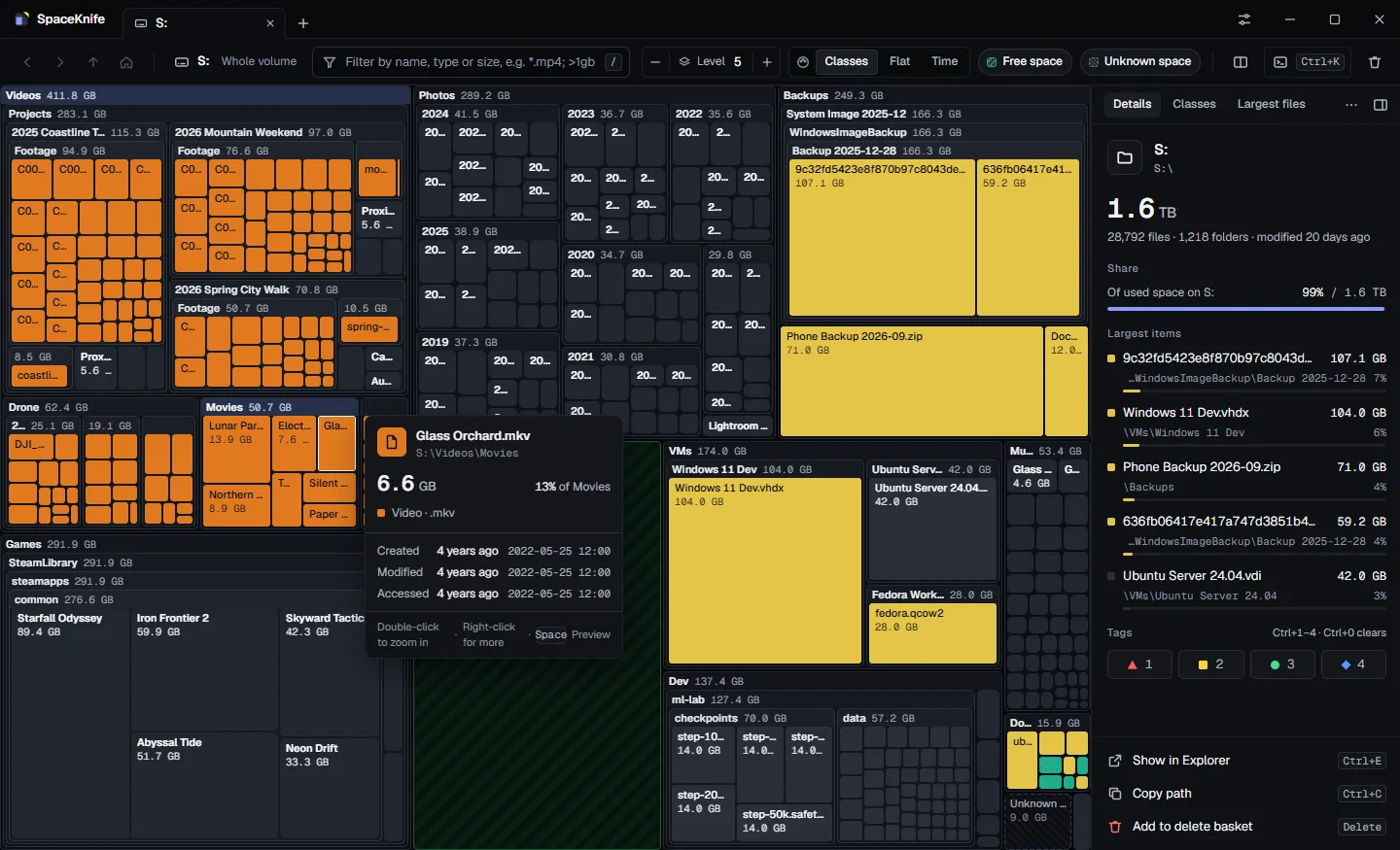SpaceKnife showing a 2 TB drive as a nested treemap, with a hover card over a large video file